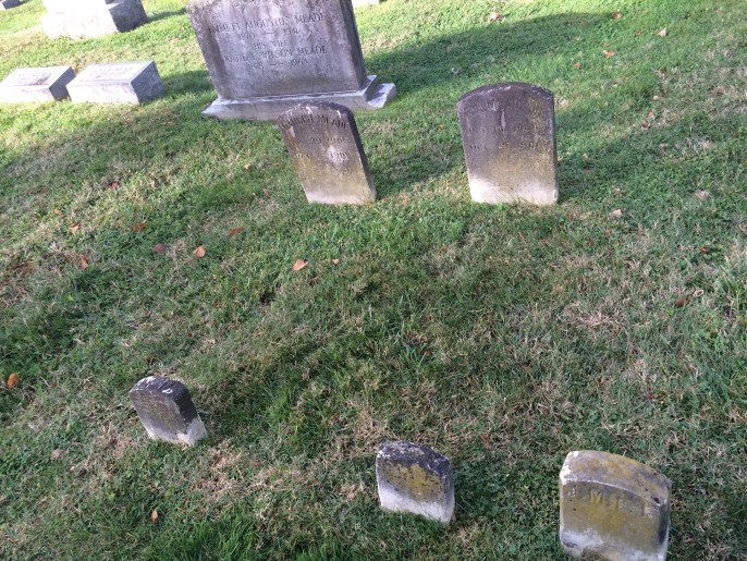 Francis Emmett Meade, age 10 months (left) and Emmett Augustus Meade, age 10 days right). Note the odd third footstone on the bottom right of the photo.