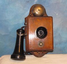 Notice the bell on top of this one. I can't see a bell on the one in the PHS image, but it may be located lower on the box. Source: Pinterest.