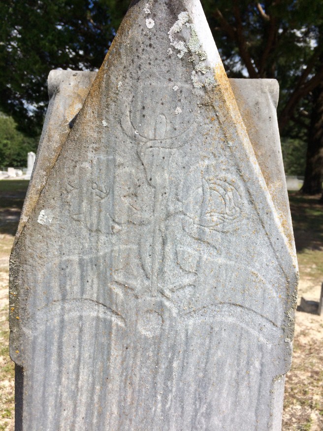 It's a better image of the carving on this stone. The rest of the back of Elizabeth's stone is smooth. No additional words.