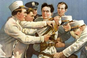 Harry Houdini in a straightjacket. Source: MentalFloss.com