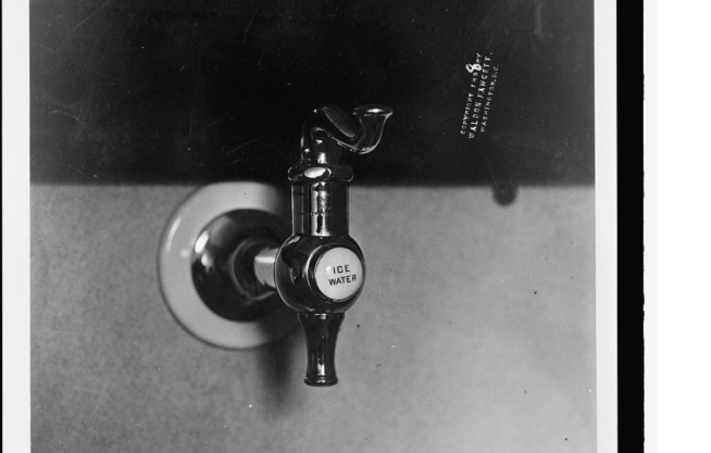 Right in the center of the sink, which is conveniently located by your office door, is an ice water spigot. Source: www.loc.gov