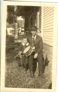 Cephas Love Wilson's son-in-law, Ira Martin, with Ceph's grandson, Ira Jr., in 1917. This was taken in front of Ceph's house, on Jefferson Street. Source: Ancestry.com