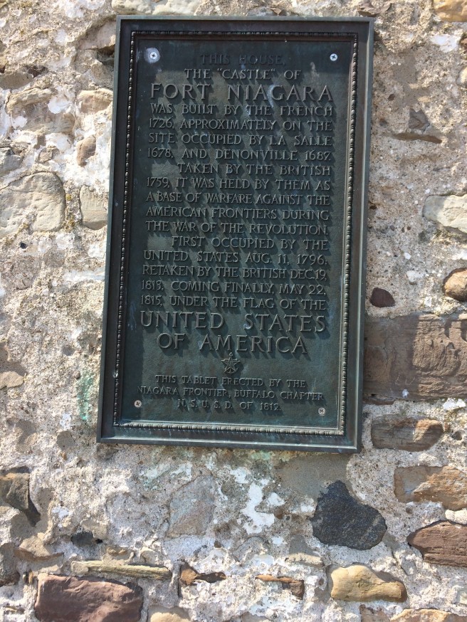 The plaque on the castle wall.